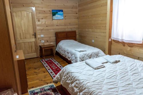 Katil atau katil-katil dalam bilik di Eco Camping Valbone