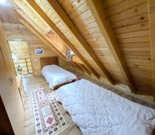 Ένα ή περισσότερα κρεβάτια σε δωμάτιο στο Eco Camping Valbone