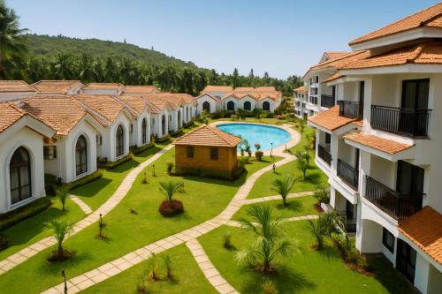 an aerial view of the courtyard of a resort at Riviera Hermitage Luxury Apartment in Anjuna
