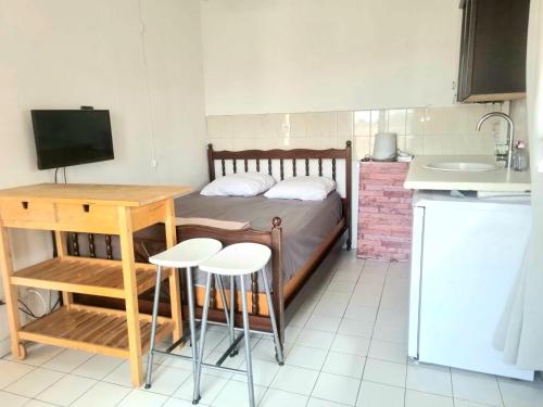 Küche/Küchenzeile in der Unterkunft Maison sur vue montagne