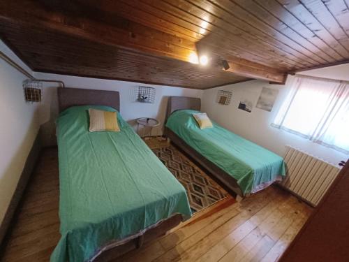 Ένα ή περισσότερα κρεβάτια σε δωμάτιο στο Villa Gracia