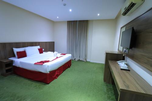 Μια τηλεόραση ή/και κέντρο ψυχαγωγίας στο فندق جولدن العالمية