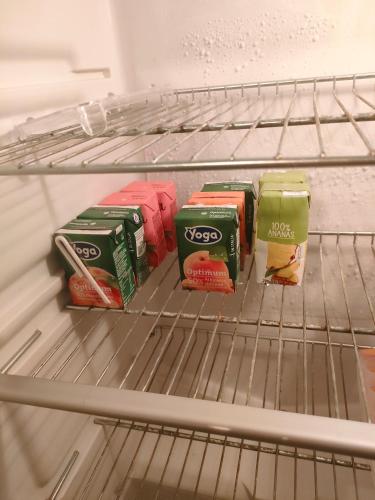 a refrigerator shelf with some food on it at Casa Olivia in Castelfiorentino