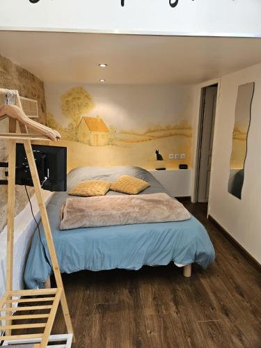 Cama o camas de una habitación en Une nuit dans le Vexin