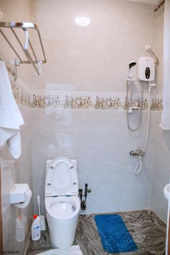 Ванная комната в maman home apartment