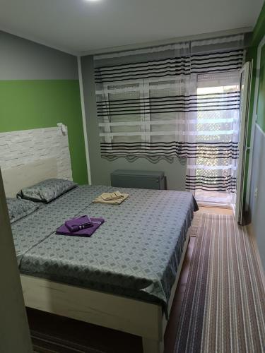 Una cama o camas en una habitación de Stan na dan