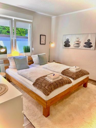 a bedroom with a large bed in a room at Reviernest in Gelsenkirchen
