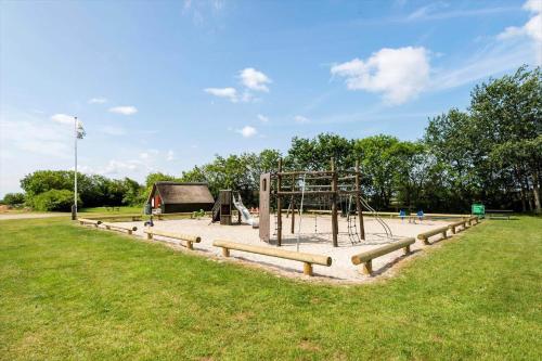 a playground in a park with a play structure at C11693-Hemmet-Bork-Hytteby-144 in Falen