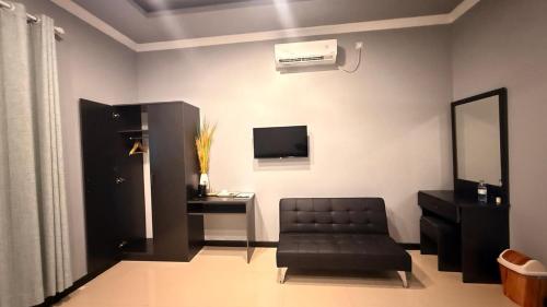 Ruang duduk di Rihiveli Inn
