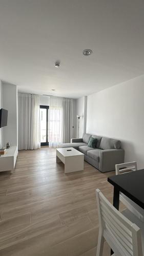 Χώρος καθιστικού στο Oliva Suite Apartamentos
