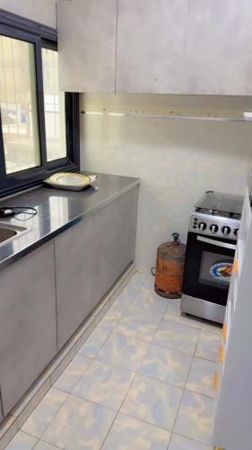 Küche/Küchenzeile in der Unterkunft Mariama Appartements 2 chambre salons