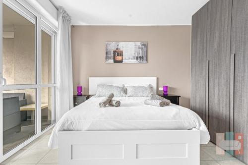 Postel nebo postele na pokoji v ubytování PE19 - Bright & Modern Apartment with Park View -