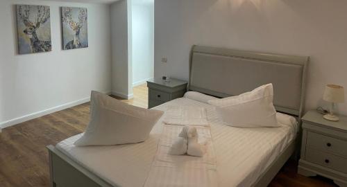 Ένα ή περισσότερα κρεβάτια σε δωμάτιο στο Dare Apartments