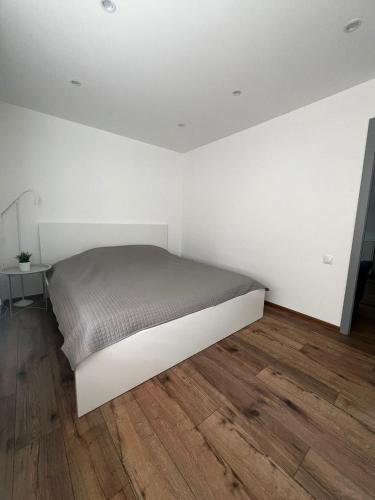 Voodi või voodid majutusasutuse CityStayLV - Jelgava Center toas
