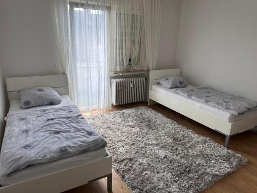 Una cama o camas en una habitación de Fewo Dragidella
