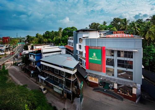 an overhead view of a building in a city at Hotel Urban Bella in Kozhikode