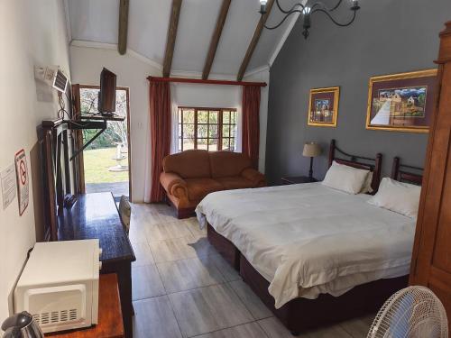 Katil atau katil-katil dalam bilik di Blue Haze Country Lodge