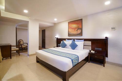 Postel nebo postele na pokoji v ubytování Hotel Horizon - Near Fateh Sagar Lake Udaipur