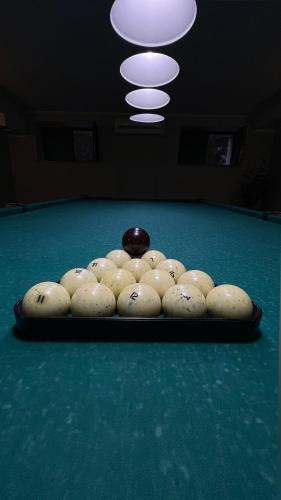 a group of sheep on a pool table at Sky luxe-hotel Astana in Astana