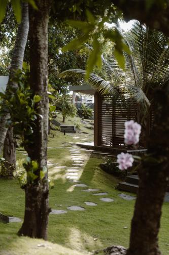 Κήπος έξω από το Sanglung Villas & Suites