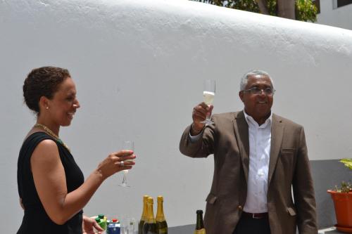 a man and a woman holding glasses of wine at Hotel Cruz Grande-Brava in Vila Nova Sintra