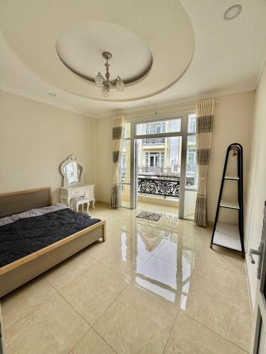 Ένα ή περισσότερα κρεβάτια σε δωμάτιο στο Nguyễn House