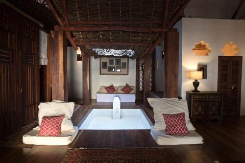 Ένα ή περισσότερα κρεβάτια σε δωμάτιο στο Mandarina Beach House