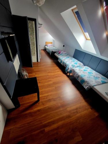 Postel nebo postele na pokoji v ubytování M Hostel