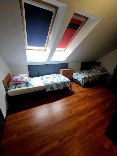 Postel nebo postele na pokoji v ubytování M Hostel