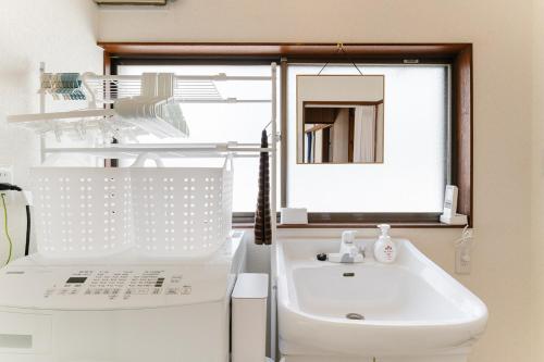 Ένα μπάνιο στο Kasai Hotel near Shinjuku, Akihabara, Asakusa TDR-Disney T-LAB 一棟まるまる葛西ホテル最大9名