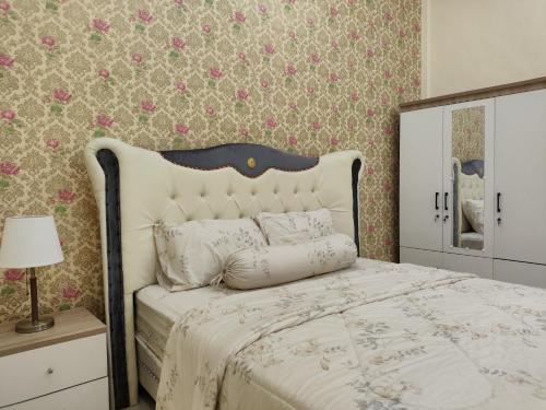 Ένα ή περισσότερα κρεβάτια σε δωμάτιο στο Family villa "Alana" in Sanur