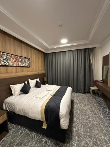 Postel nebo postele na pokoji v ubytování Sudair Karam Hotel - فندق سدير كرم
