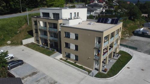 an overhead view of a building with a parking lot at Apartmány Starý Blich in Bardejov