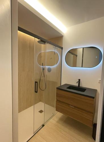 a bathroom with a shower and a sink at A Design Casa in Own Private Hills for Adult Only in Alginet