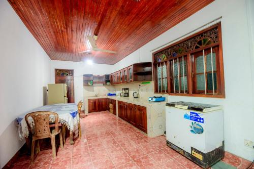 Kuchyň nebo kuchyňský kout v ubytování Villa Oceanora