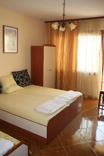 Postel nebo postele na pokoji v ubytování Homestay Kostadinov