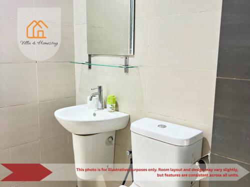 a bathroom with a white toilet and a sink at RumaKU at Cybersquare SOHO Cyberjaya - Studio - Wifi in Cyberjaya