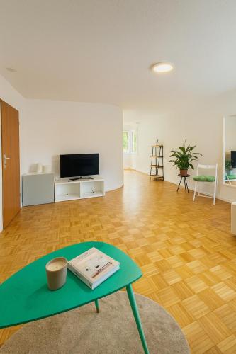 Gallery image of Bright furnished Studio with workspace and garden area near Zurich in Würenlos