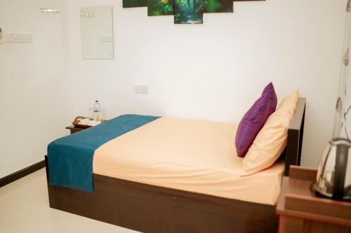 Postel nebo postele na pokoji v ubytování Batti Lagoon Hotel