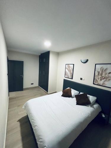 Llit o llits en una habitació de DELYA Maria