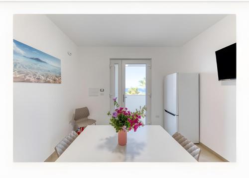 Kuchyň nebo kuchyňský kout v ubytování Residence Fronte Mare