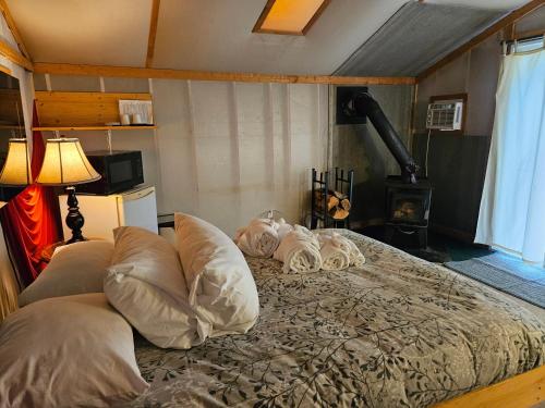 Кровать или кровати в номере Éco Spa Highland