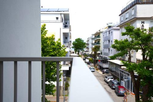 a view from a balcony of a street with cars at Hotel Sant'Elena in Rimini
