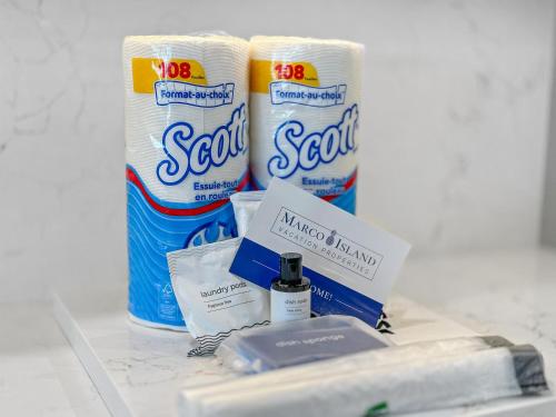 a counter with some toilet paper and a bottle of soap at 2024 Monsterrat model waterfront home with lap pool in Marco Island