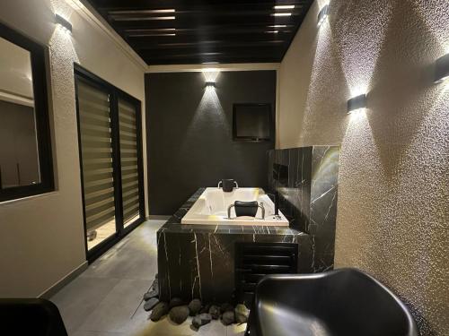 Un lugar para sentarse en Departamento luxury y privado Equipetrol