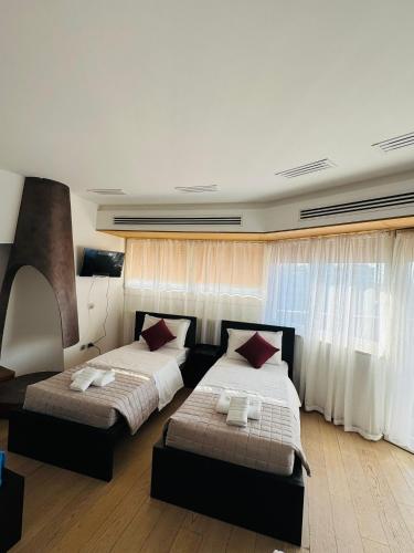 a bedroom with two beds and a couch at MMM HOME Train Station 4 in Mestre