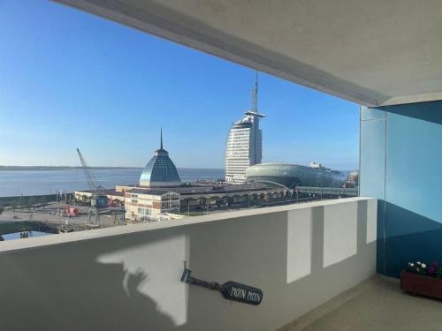 a view of a city from a room with a window at Ferienwohnung Wolke 7 in Bremerhaven