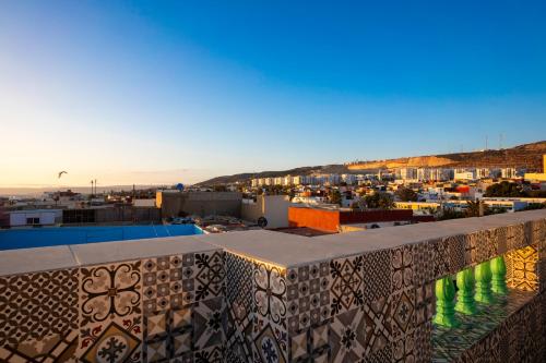 a view of a city from a balcony at Dar Diafa Anza in Agadir