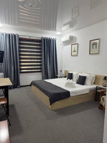 Katil atau katil-katil dalam bilik di Temurkhan Hotel