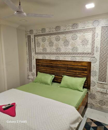 Ein Bett oder Betten in einem Zimmer der Unterkunft Hotel Roxy GKR